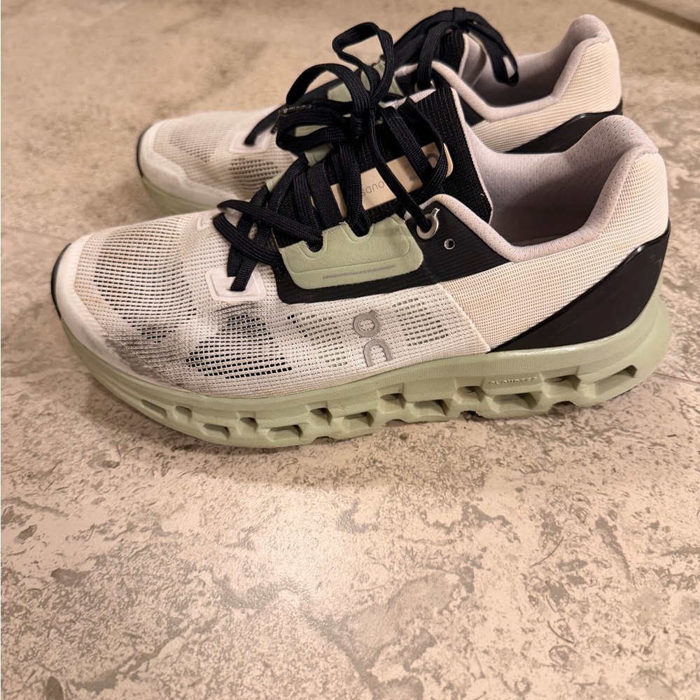 On Running Green and White Athletic Shoes